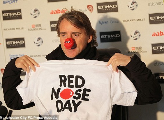 Mancini `Lempar Handuk`pada Manchester United